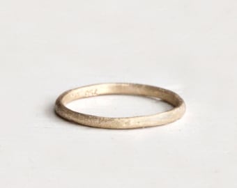 A sweet rustic wedding band. 18k. Simple love. Bean