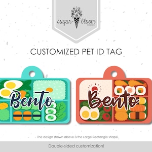 May include: Customized pet ID tags in the shape of bento boxes. One tag is teal with egg, rice, and sushi illustrations, the other is coral with sushi, egg, and tomato illustrations. The word "Bento" is written on each tag.