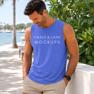 May include: A bright blue sleeveless tank top featuring the white text GRACE & LANE MOCKUPS printed across the chest. The garment has a crew neckline and wide arm openings, worn with light beige shorts and a black digital wristwatch on the wrist.