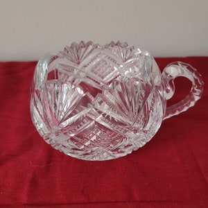 American Brilliant Period Cut Glass bowl With Handle