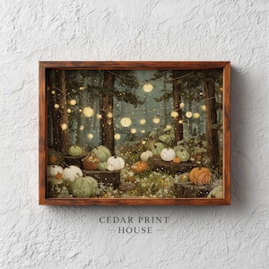 May include: A framed wall art print featuring a forest scene with glowing string lights hanging between trees, surrounded by various pumpkins in shades of orange, white, and green, with the text CEDAR PRINT HOUSE printed below the frame.
