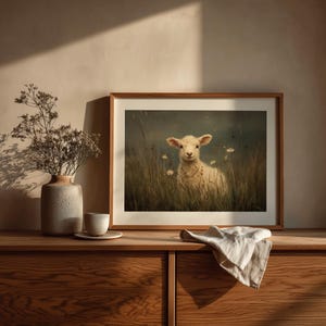 Lamb artwork digital download for farmhouse decor — gentle creature surrounded by lush grass and wildflowers, embodying comfort and tranquility.