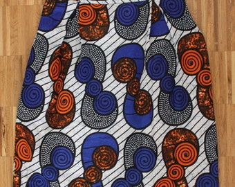 Pleated African Wax Print knee length skirt with side zipper. Size US 2 /UK 6. Waist 26 inches. Ships from USA