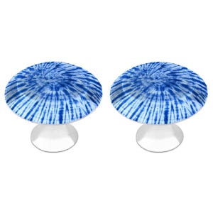 May include: Two cabinet knobs featuring a circular top with a blue and white tie-dye spiral pattern. Each knob has a smooth, silver-toned metallic base that tapers slightly toward the bottom, providing a sturdy mount for furniture installation.