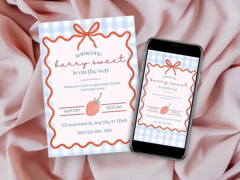 May include: Baby shower invitation with a light blue gingham background and a pink scalloped border. The invitation reads "someone berry sweet is on the way" with a strawberry graphic. A smartphone displays the same design.