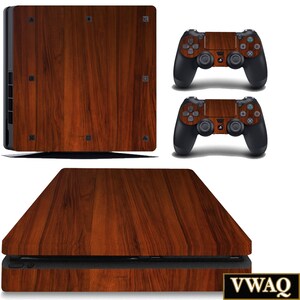May include: A wood-grain patterned skin for a Playstation 4 console and controller. The skin is brown with a wood grain pattern. The skin is shown on a console and controller.