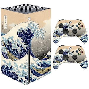 May include: A set of two console skins featuring a Japanese woodblock print of a large wave crashing against a mountain. The design is in shades of blue, white, and gray. The skins are designed to fit the Xbox Series X console and controller.
