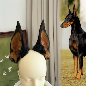 May include: A white ceramic mug with a black handle and the text "But First, Coffee" in a black, bold font. The mug is sitting on a wooden surface. The mug is 4 inches tall.