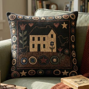 May include: A white ceramic mug with a black handle and the text "But first, coffee" in a black, handwritten-style font. The mug is on a white surface.