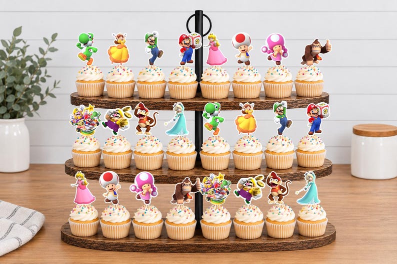 Pu&ograve; includere: Un'alzata per cupcake in legno a tre livelli contenente ventidue cupcake, ognuno sormontato da una sagoma di carta colorata raffigurante vari personaggi dei videogiochi Nintendo, tra cui Mario, Luigi, la Principessa Peach, Yoshi, Toad e Donkey Kong.