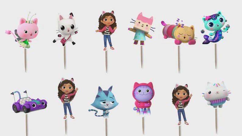 May include: A set of twelve decorative cupcake toppers featuring colorful cartoon characters, including cats, a girl with cat ears, a purple toy car, and a sleeping cat, each attached to a thin wooden pick for insertion into food items.