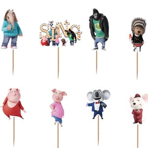 May include: A collection of cupcake toppers featuring characters from the animated movie "Sing." The toppers depict various animal characters, including a gorilla, pig, koala, and mouse, each with unique outfits and expressions. The "Sing" logo is also included.