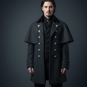 May include: A dark gray, double-breasted coat with a cape-like shoulder detail. The coat features silver-colored buttons and a black velvet collar. The person in the image is wearing a black vest and shirt underneath the coat. The overall style is reminiscent of Victorian era fashion.