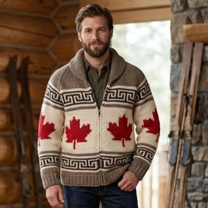 May include: A knitted zip-up sweater in beige, brown, and red, adorned with red maple leaf motifs. The sweater has a shawl collar and a geometric pattern. The garment is made of a thick, knitted material.
