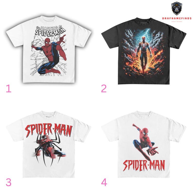May include: Four white t-shirts featuring Spider-Man graphics. The designs include Spider-Man in action poses, with the text "The Amazing Spider-Man" and "Spider-Man" in red and white lettering. One shirt is black with a Spider-Man graphic.