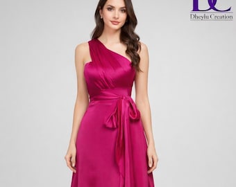 Vestido de seda rosa de diseñador para fiestas y ocasiones festivas.