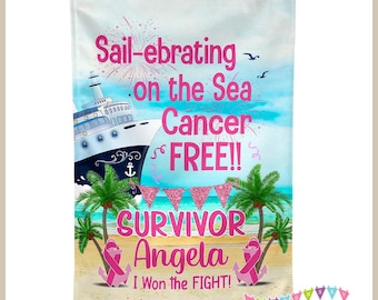 May include: A pink and blue garden flag with a cruise ship, palm trees, and the text "Sail-ebrating on the Sea Cancer FREE!! SURVIVOR Angela I Won the FIGHT!"