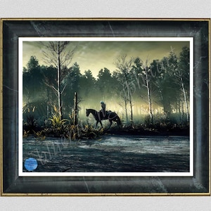 May include: A framed print depicting a person riding a horse through a misty forest. The artwork features a dark color palette with a river in the foreground and trees in the background. The frame is black with gold trim.