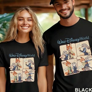 May include: Black t-shirts featuring a cartoon graphic of Nick Wilde and Judy Hopps from Disney's Zootopia. The shirts have the text "Walt Disney World" in a light blue script. The graphic is a series of four panels with the characters in different poses.