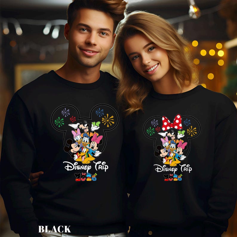 May include: A white ceramic mug with a black handle and the text "But First, Coffee" in a bold, black font. The mug is set against a blurred background, highlighting the clean design.