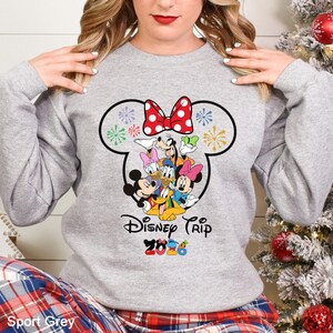 May include: A rustic wooden sign with the text "Welcome to our home" in white lettering. The sign features a distressed finish and a simple, inviting design, perfect for a front porch or entryway.