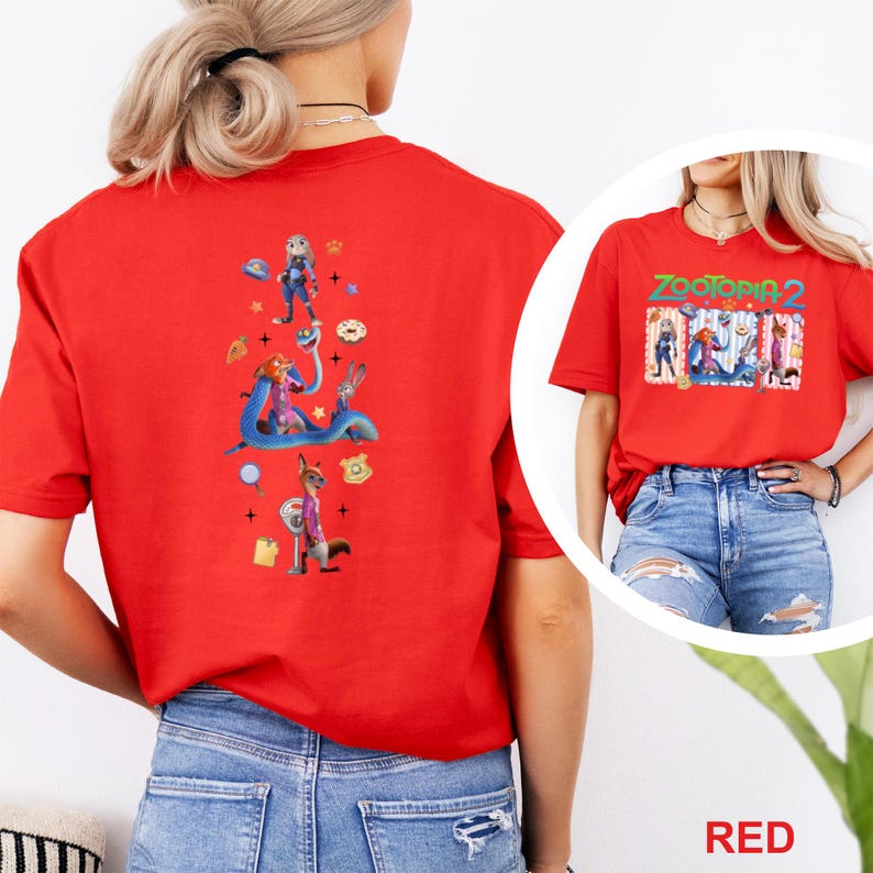 May include: A red t-shirt with characters from Zootopia 2. The front of the shirt displays the movie title and characters, while the back features a vertical arrangement of characters and icons. The shirt is made of a soft material.