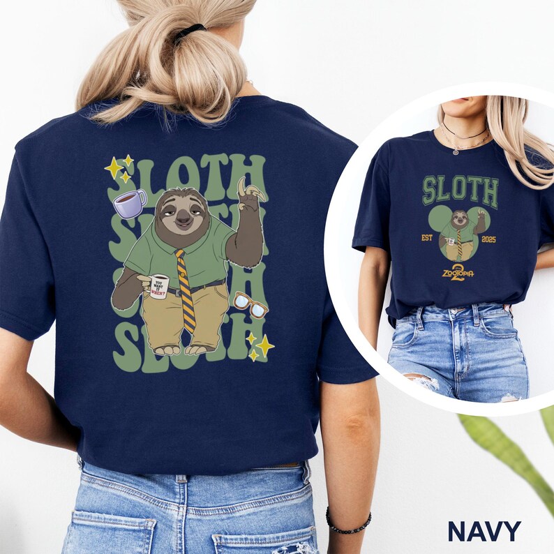 May include: Navy blue t-shirt featuring a cartoon sloth character with the word "SLOTH" in a green, stylized font. The sloth is wearing a green shirt, khaki pants, and a striped tie. The design includes coffee, glasses, and stars.