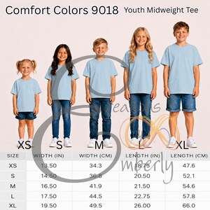 May include: Comfort Colors 9018 Youth Midweight Tee size chart showing five children wearing light blue short-sleeve t-shirts with blue denim bottoms. A table lists sizes XS through XL with corresponding width and length in inches and centimeters.