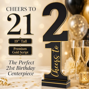 May include: A black and gold 21st birthday centerpiece standing 19 inches tall. The number 21 is displayed in a large, bold font with gold trim. The text "Cheers to" is written in gold script on the number one. It features a rectangular base.