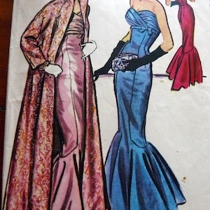 May include: A vintage illustration of two women wearing formal gowns. One woman is wearing a pink gown with a long, patterned coat. The other woman is wearing a blue gown with a fitted bodice and a flowing skirt. Both women are wearing gloves and have their hair styled in updos.