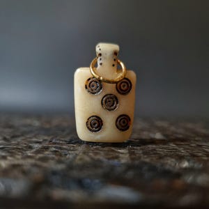 Antique tibetan amulet thogchag| himalayan talisman| 20th century| rare buddhist protection pendant| turquoise, antique coral, dzi bead