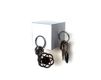 Wall mounted magnetic keychain holder