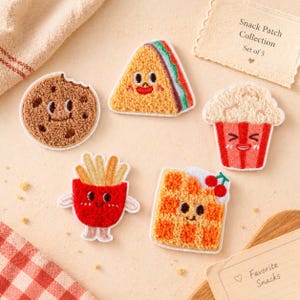 May include: A collection of five embroidered snack patches, including a cookie, sandwich, popcorn, french fries, and waffle. Each patch features a smiling face and is set against a neutral background. The text "Snack Patch Collection Set of 5" is visible.