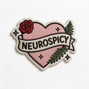 May include: Embroidered patch in the shape of a pink heart with a red rose and green leaves. The patch has a white banner with the word "NEUROSPICY" in black. Four small star shapes are also included.