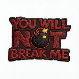 May include: Embroidered patch with the words "YOU WILL NOT BREAK ME" in red, block letters. A black bomb with a yellow explosion is in the center. The patch has a black border and is on a white background.
