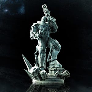 May include: A detailed, gray-toned statue of a futuristic soldier holding a large weapon. The figure is clad in armored clothing and stands atop a detailed base with geometric shapes. The background is a dark gradient, emphasizing the statue's form.
