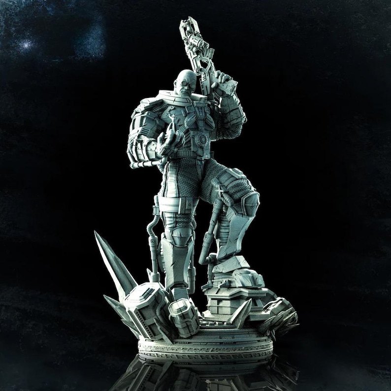 May include: A detailed, gray-toned statue of a futuristic soldier holding a large weapon. The figure is clad in armored clothing and stands atop a detailed base with geometric shapes. The background is a dark gradient, emphasizing the statue's form.