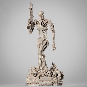 May include: A detailed, light gray statue of the Terminator robot holding a rifle. The statue is standing on a base with skulls and flames, with the text "THE TERMINATOR" on the base.