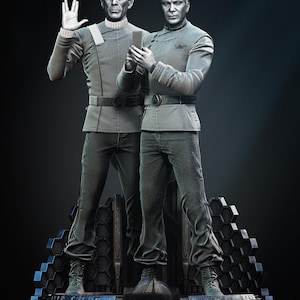 May include: A grayscale sculpture of two figures in Star Trek uniforms. One figure is giving the Vulcan salute, while the other holds a device. Both figures are standing on a detailed, geometric base. The figures are wearing gray uniforms with black pants and belts.