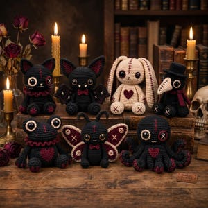 May include: A collection of six crocheted plush toys including a black cat, a bat, a cream-colored rabbit with a heart, a plague doctor, a frog, a butterfly, and an octopus, all featuring stitched details and dark, muted color accents.