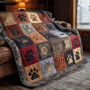 Ancestral Wildprint Quiltad filt, tribal djurmönster Quilt, infödd inspirerad sängkläder, mysig boho pläd, present till familjens heminredning