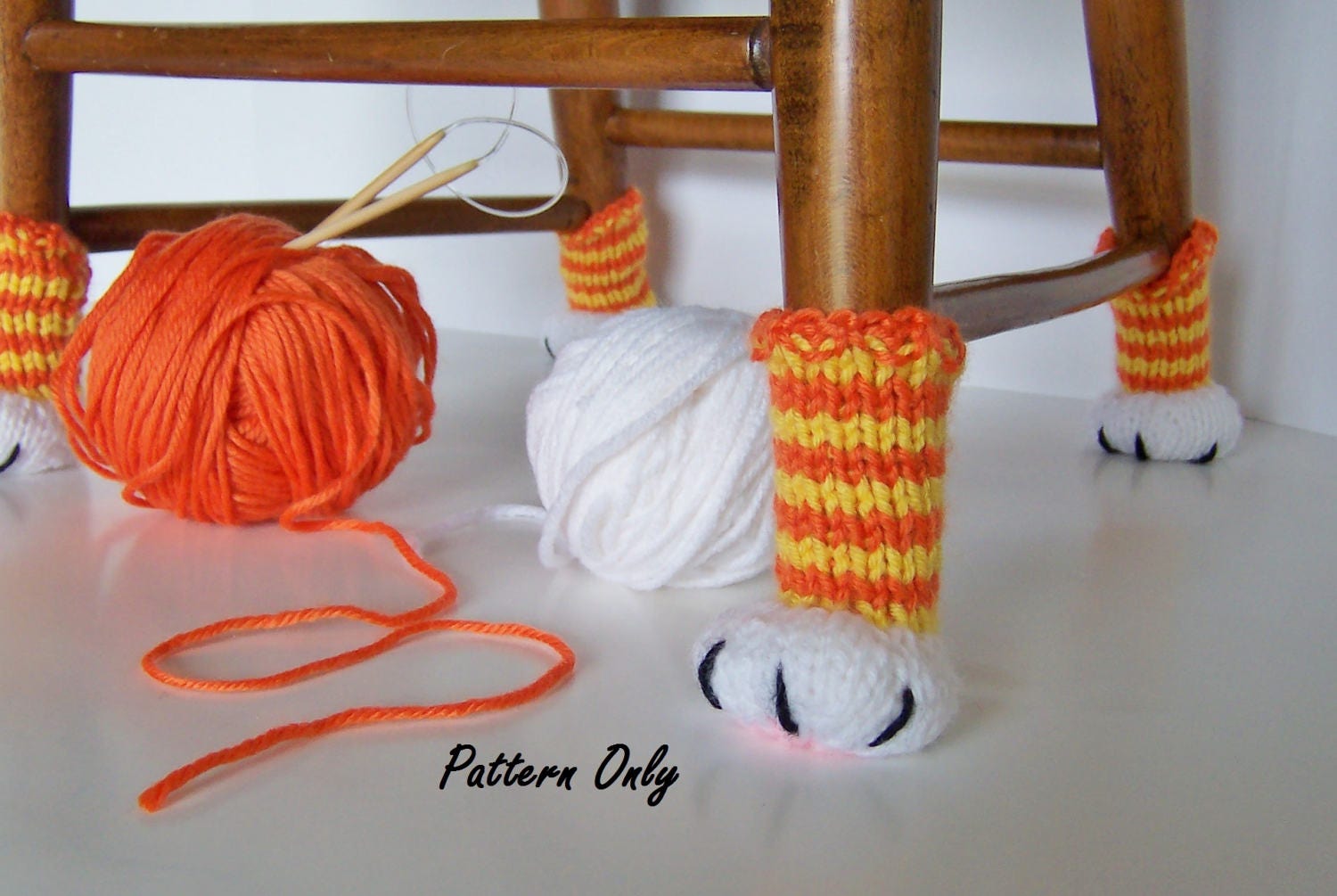 Currently making cat paw chair socks, and I'm dying over how cute