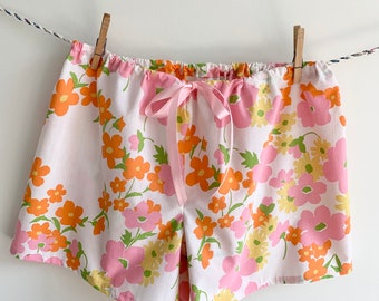 Women’s Pajama Shorts Size M/L, Fits Hips <49” made from a vintage bed sheet in pink and orange, super soft, comfy and cool, drawstring