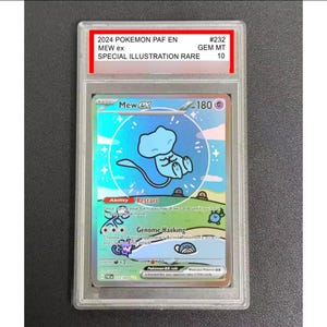 May include: A graded Pokémon card featuring Mew ex, a special illustration rare from the 2024 PAF EN set. The card is encased in a protective holder and graded GEM MT 10. The card has a blue Mew illustration.