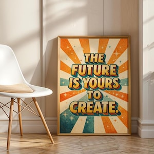 Könnte beinhalten: Ein gerahmtes Poster mit dem Text "THE FUTURE IS YOURS TO CREATE" im Retro-Stil. Das Poster hat einen goldenen Rahmen, orange und blaue Strahlen und Sternakzente. Das Poster lehnt an einer Wand neben einem weißen Stuhl.