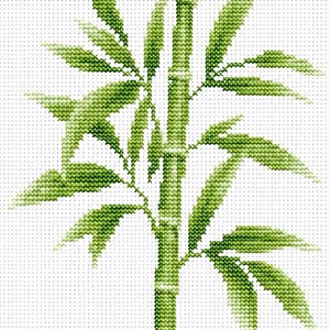 May include: A cross-stitch embroidery pattern featuring a single stalk of bamboo with multiple pointed leaves. The design uses various shades of green thread to create depth and texture on a white grid fabric background with visible holes.