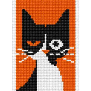 May include: A cross-stitch pattern featuring a stylised cat face against a vibrant orange background. The cat is rendered in black and white, with a white chest, black ears, and a distinct black and white face design with white whiskers.