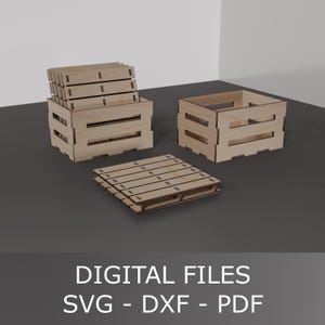 May include: A collection of laser-cut wooden crates and a pallet. The crates are rectangular with horizontal slats and a stack of lids. The pallet is also made of wood. The text "DIGITAL FILES SVG - DXF - PDF" is at the bottom.