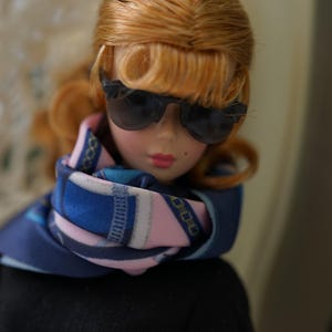 Vintage Hollywood-inspired 1/6 doll styling with sunglasses and a patterned scarf