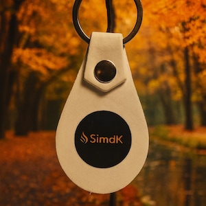 May include: A set of three ceramic mugs with a speckled, matte finish. The mugs are in shades of cream, light gray, and dark gray. Each mug has a simple, minimalist design, perfect for coffee or tea.